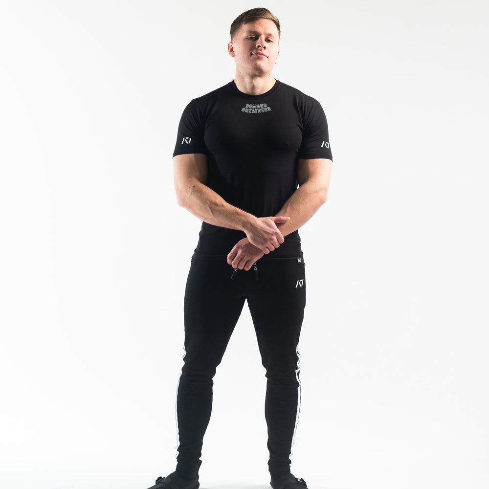 
                      
                        DG23 Domino is our new meet shirt design highlighting Demand Greatness with a double outline font to showcase your impact on the platform. The DG23 Meet Shirt is IPF Approved. Shop the full A7 Powerlifting IPF Approved Equipment collection. The IPF Approved Kit includes Powerlifting Singlet, A7 Meet Shirt, A7 Zebra Wrist Wraps, A7 Deadlift Socks, Hourglass Knee Sleeves (Stiff Knee Sleeves and Rigor Mortis Knee Sleeves). All A7 Powerlifting Equipment shipping to UK, Norway, Switzerland and Iceland.
                      
                    