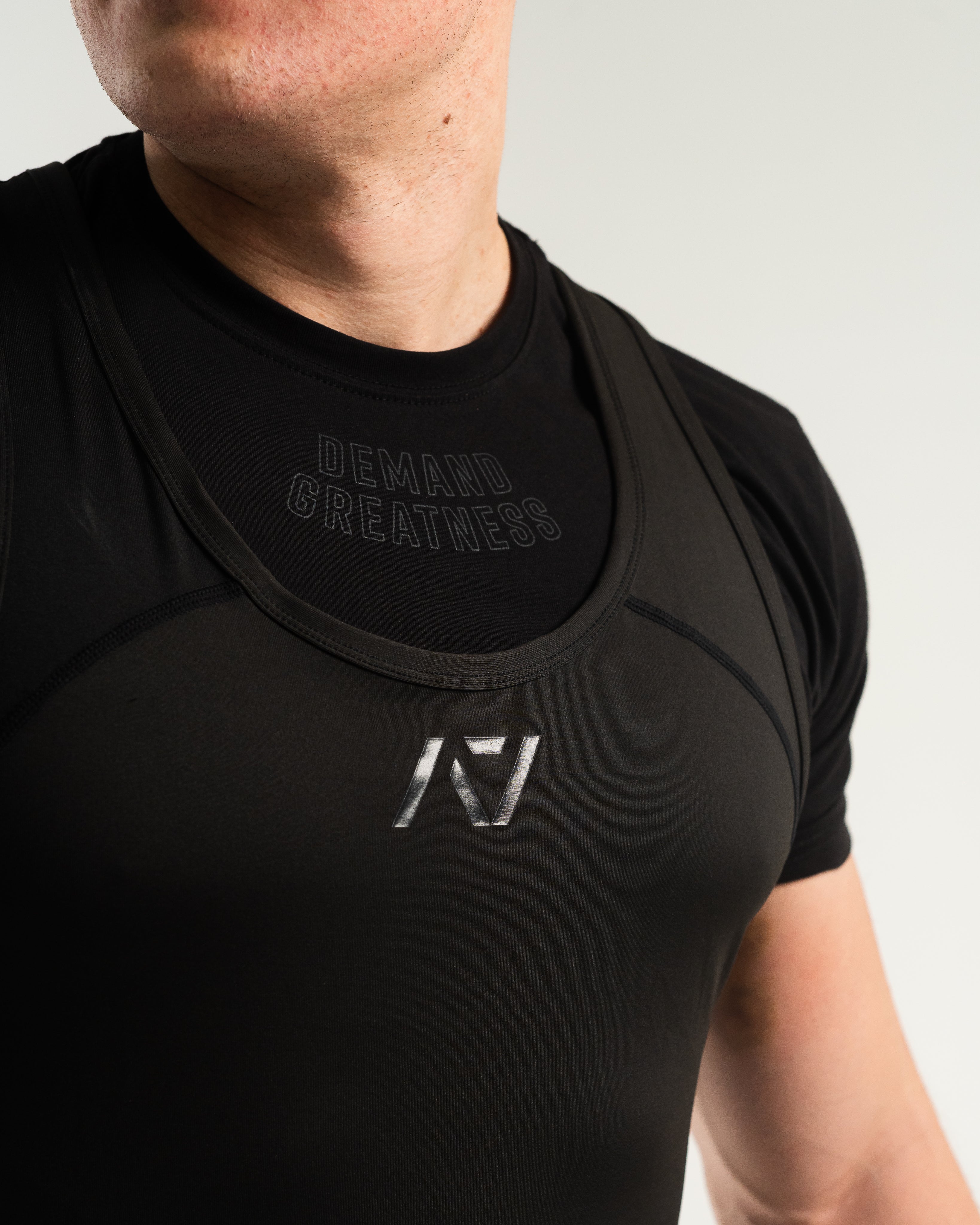 A7 IPF Approved Stealth Luno singlet features extra lat mobility, side panel stitching to guide the squat depth level and curved panel design for a slimming look. The Women's cut singlet features a tapered waist and additional quad room. The IPF Approved Kit includes Luno Powerlifting Singlet, A7 Meet Shirt, A7 Zebra Wrist Wraps, A7 Deadlift Socks, Hourglass Knee Sleeves (Stiff Knee Sleeves and Rigor Mortis Knee Sleeves). All A7 Powerlifting Equipment shipping to UK, Norway, Switzerland and Iceland.