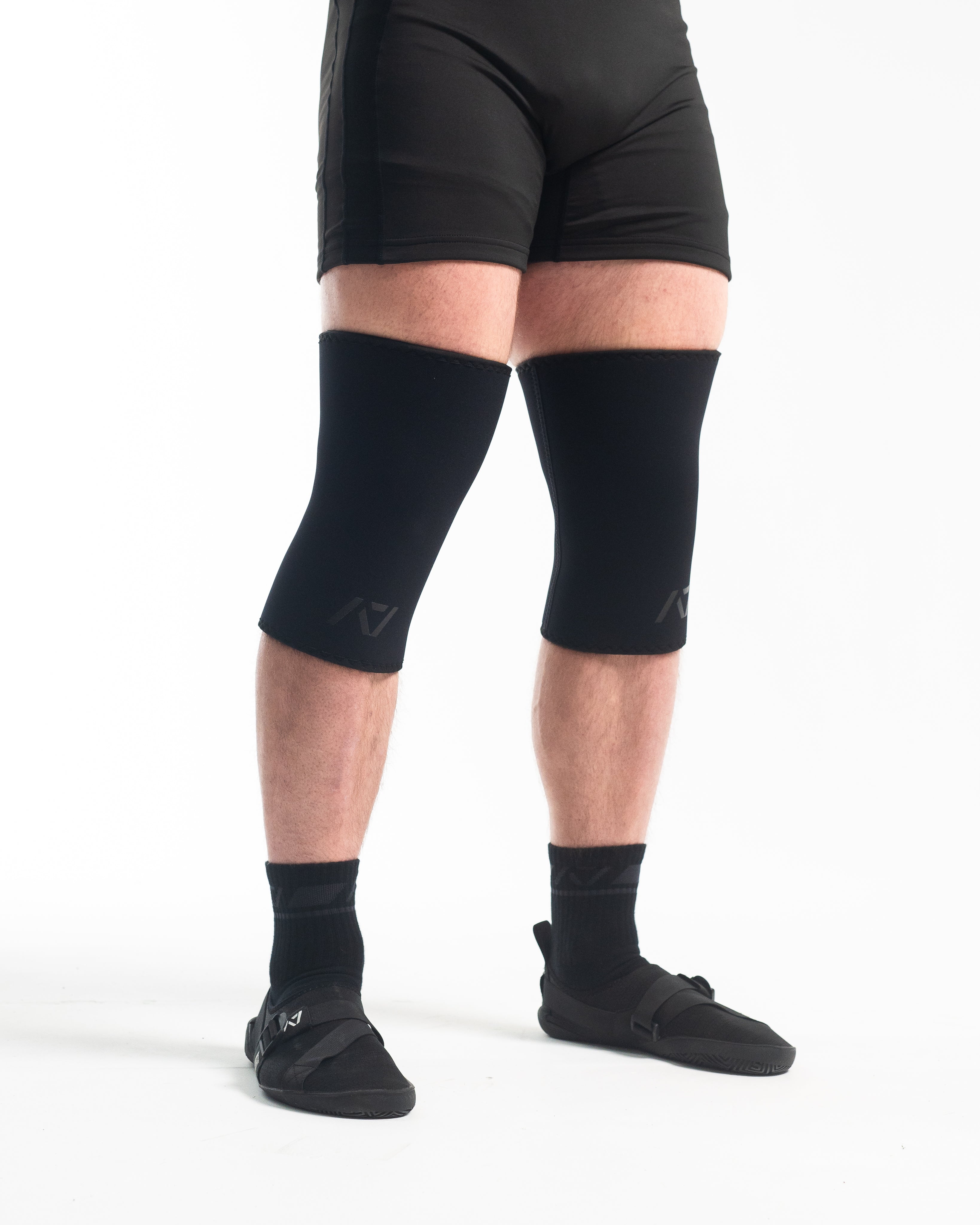 A7 IPF Approved Hourglass Knee Sleeves feature an hourglass-shaped centre taper fit to help provide knee compression while maintaining proper tightness around the calf and quad, offered in three stiffnesses (Flexi, Stiff and Rigor Mortis). Shop the full A7 Powerlifting IPF Approved Equipment collection. The IPF Approved Kit includes Powerlifting Singlet, A7 Meet Shirt, A7 Zebra Wrist Wraps and A7 Deadlift Socks. All A7 Powerlifting Equipment shipping to UK, Norway, Switzerland and Iceland.