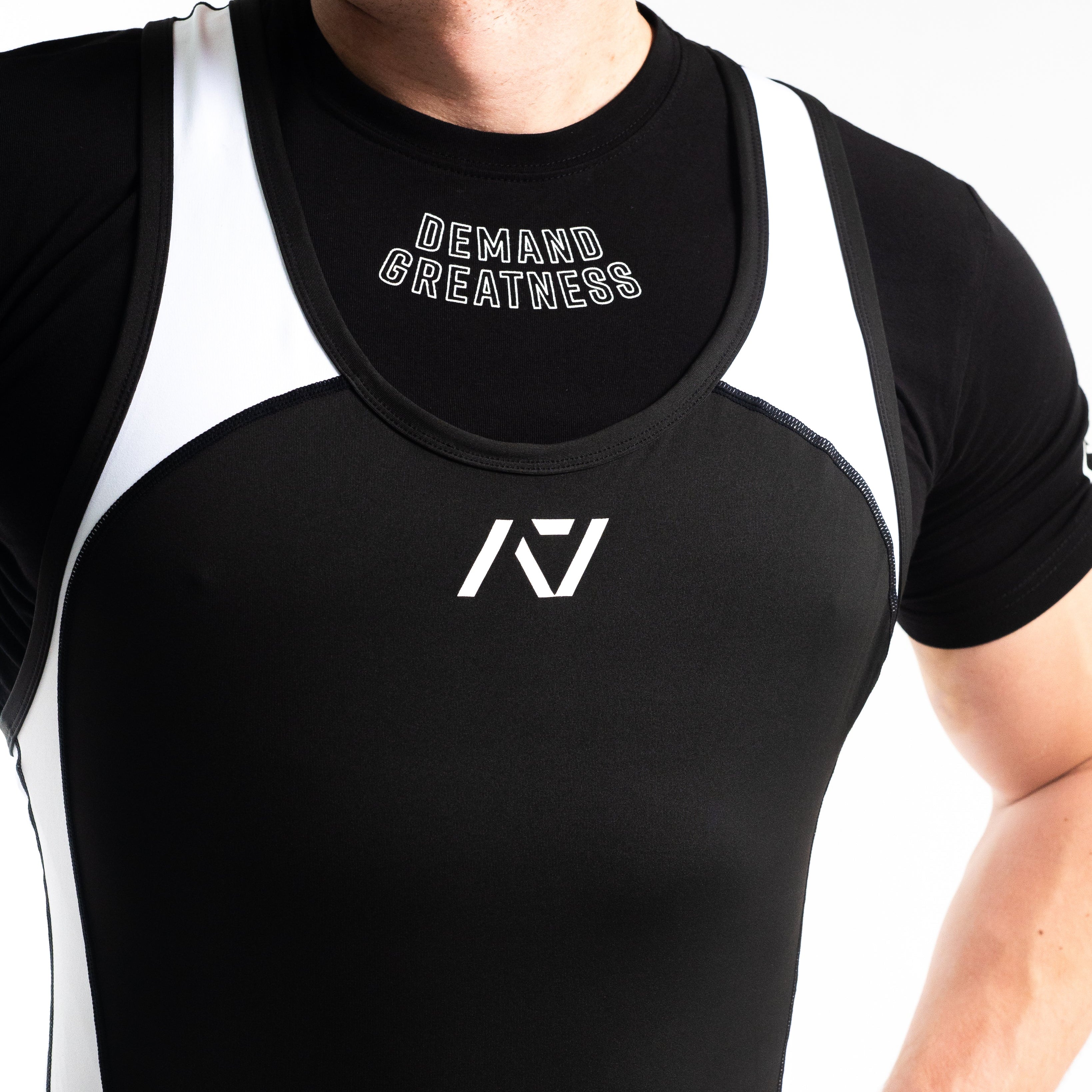 A7 IPF Approved Domino Luno singlet features extra lat mobility, side panel stitching to guide the squat depth level and curved panel design for a slimming look. The Women's cut singlet features a tapered waist and additional quad room. The IPF Approved Kit includes Luno Powerlifting Singlet, A7 Meet Shirt, A7 Zebra Wrist Wraps, A7 Deadlift Socks, Hourglass Knee Sleeves (Stiff Knee Sleeves and Rigor Mortis Knee Sleeves). All A7 Powerlifting Equipment shipping to UK, Norway, Switzerland and Iceland.