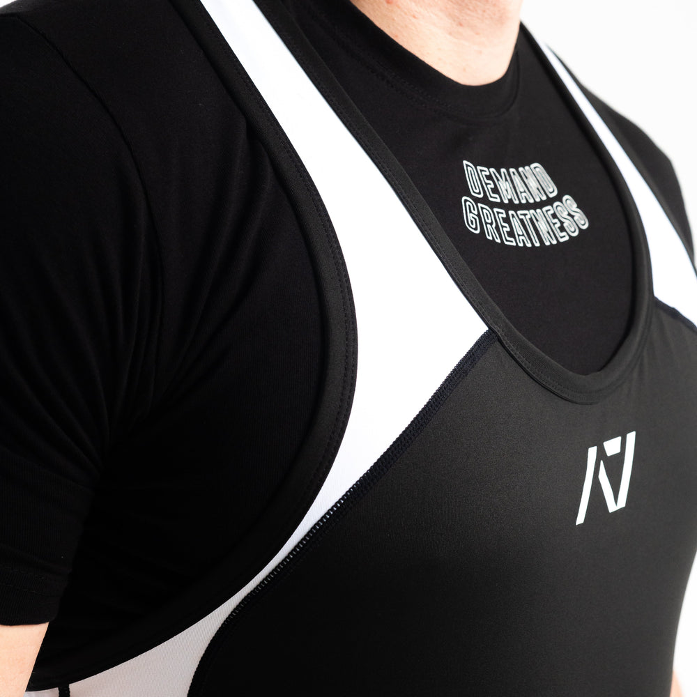 
                      
                        A7 IPF Approved Domino Luno singlet features extra lat mobility, side panel stitching to guide the squat depth level and curved panel design for a slimming look. The Women's cut singlet features a tapered waist and additional quad room. The IPF Approved Kit includes Luno Powerlifting Singlet, A7 Meet Shirt, A7 Zebra Wrist Wraps, A7 Deadlift Socks, Hourglass Knee Sleeves (Stiff Knee Sleeves and Rigor Mortis Knee Sleeves). All A7 Powerlifting Equipment shipping to UK, Norway, Switzerland and Iceland.
                      
                    