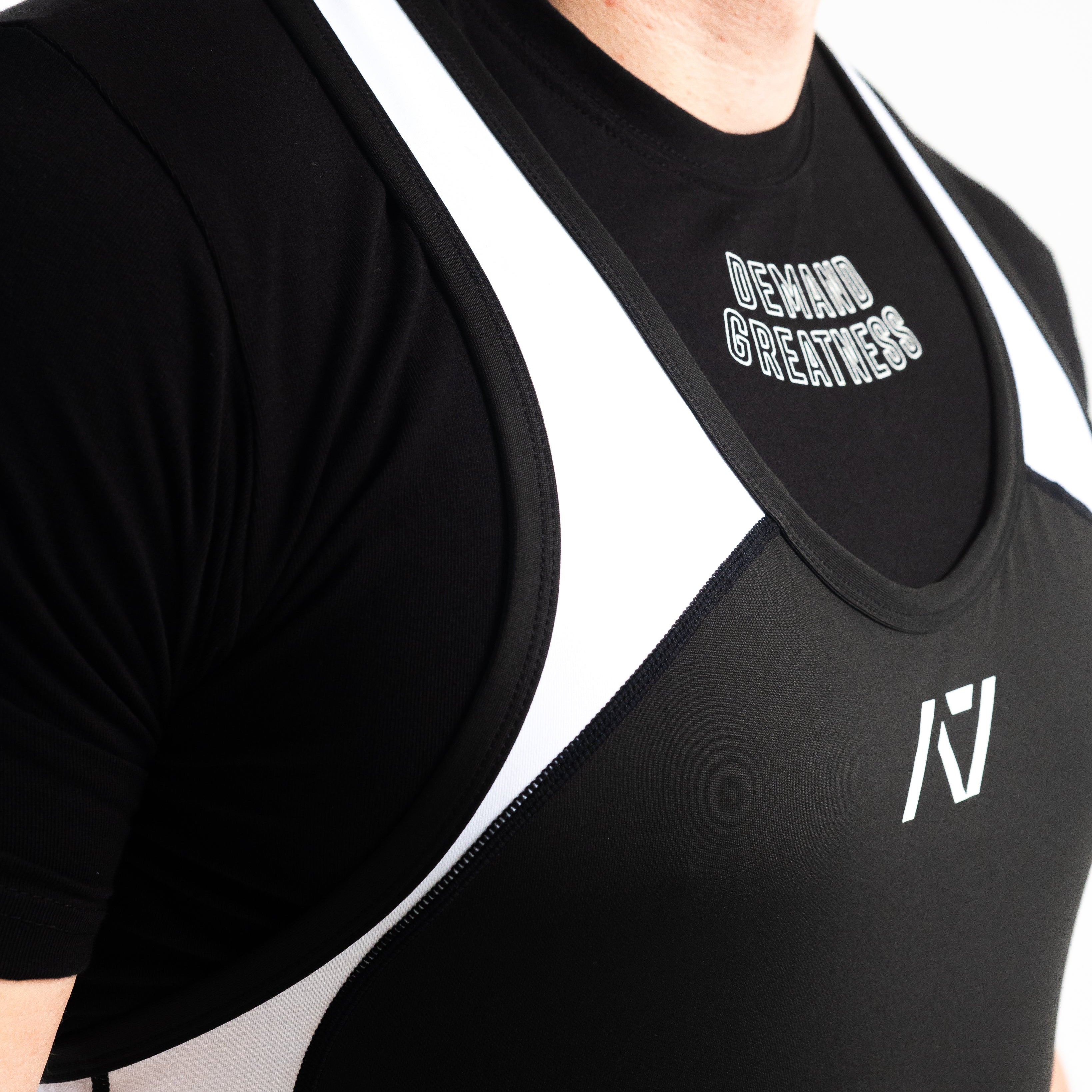 A7 IPF Approved Domino Luno singlet features extra lat mobility, side panel stitching to guide the squat depth level and curved panel design for a slimming look. The Women's cut singlet features a tapered waist and additional quad room. The IPF Approved Kit includes Luno Powerlifting Singlet, A7 Meet Shirt, A7 Zebra Wrist Wraps, A7 Deadlift Socks, Hourglass Knee Sleeves (Stiff Knee Sleeves and Rigor Mortis Knee Sleeves). All A7 Powerlifting Equipment shipping to UK, Norway, Switzerland and Iceland.