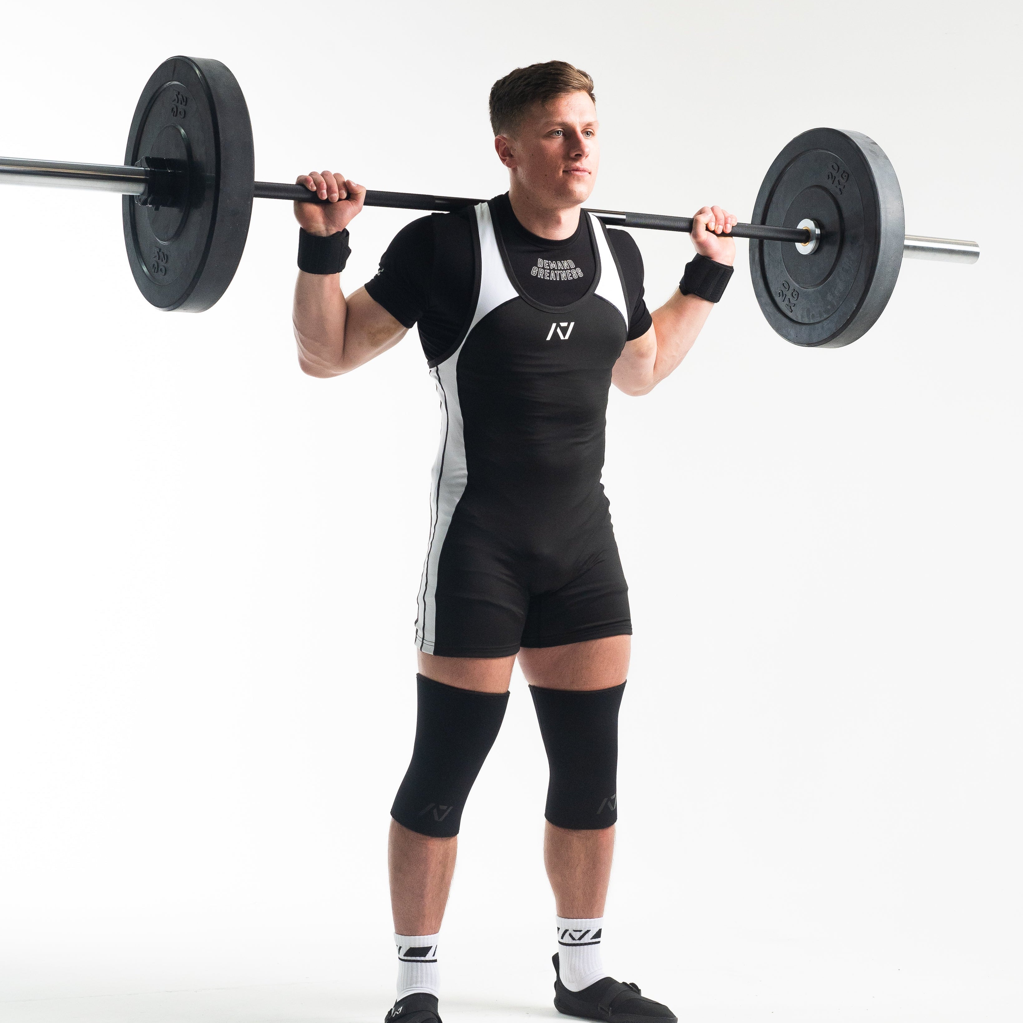 A7 IPF Approved Domino Luno singlet features extra lat mobility, side panel stitching to guide the squat depth level and curved panel design for a slimming look. The Women's cut singlet features a tapered waist and additional quad room. The IPF Approved Kit includes Luno Powerlifting Singlet, A7 Meet Shirt, A7 Zebra Wrist Wraps, A7 Deadlift Socks, Hourglass Knee Sleeves (Stiff Knee Sleeves and Rigor Mortis Knee Sleeves). All A7 Powerlifting Equipment shipping to UK, Norway, Switzerland and Iceland.