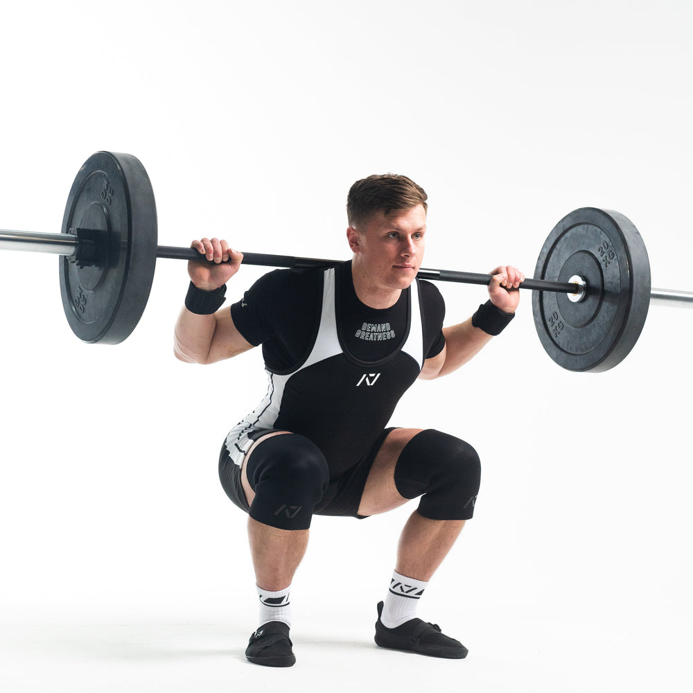 
                      
                        A7 IPF Approved Domino Luno singlet features extra lat mobility, side panel stitching to guide the squat depth level and curved panel design for a slimming look. The Women's cut singlet features a tapered waist and additional quad room. The IPF Approved Kit includes Luno Powerlifting Singlet, A7 Meet Shirt, A7 Zebra Wrist Wraps, A7 Deadlift Socks, Hourglass Knee Sleeves (Stiff Knee Sleeves and Rigor Mortis Knee Sleeves). All A7 Powerlifting Equipment shipping to UK, Norway, Switzerland and Iceland.
                      
                    