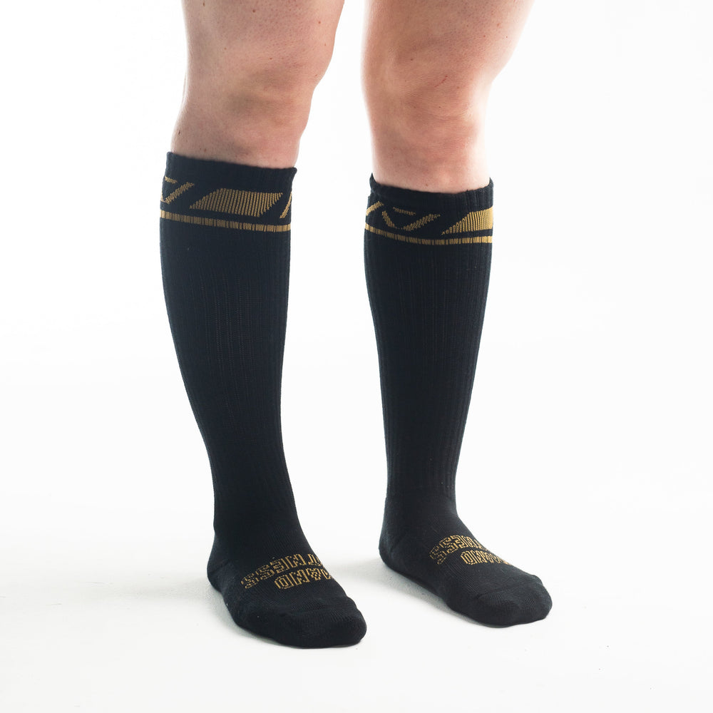 
                      
                        A7 Gold Standard Deadlift socks are designed specifically for pulls and keep your shins protected from scrapes. A7 deadlift socks are a perfect pair to wear in training or powerlifting competition. The IPF Approved Kit includes Powerlifting Singlet, A7 Meet Shirt, A7 Zebra Wrist Wraps, A7 Deadlift Socks, Hourglass Knee Sleeves (Stiff Knee Sleeves and Rigor Mortis Knee Sleeves). All A7 Powerlifting Equipment shipping to UK, Norway, Switzerland and Iceland.
                      
                    