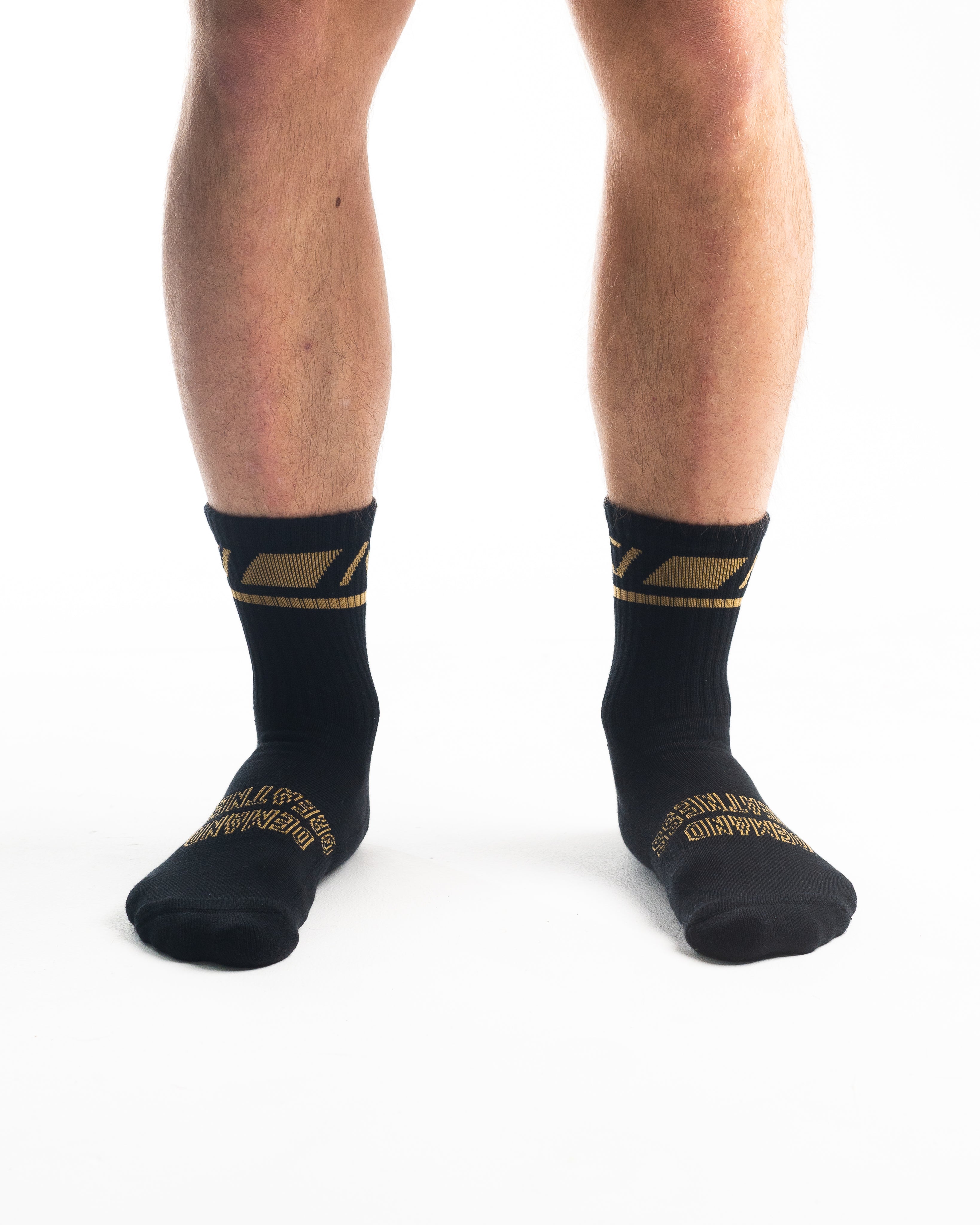 A7 Gold Standard Crew socks showcase gold logos and let your energy show on the platform, in your training or while out and about. The IPF Approved Gold Standard Meet Kit includes Powerlifting Singlet, A7 Meet Shirt, A7 Zebra Wrist Wraps, A7 Deadlift Socks, Hourglass Knee Sleeves (Stiff Knee Sleeves and Rigor Mortis Knee Sleeves). All A7 Powerlifting Equipment shipping to UK, Norway, Switzerland and Iceland.