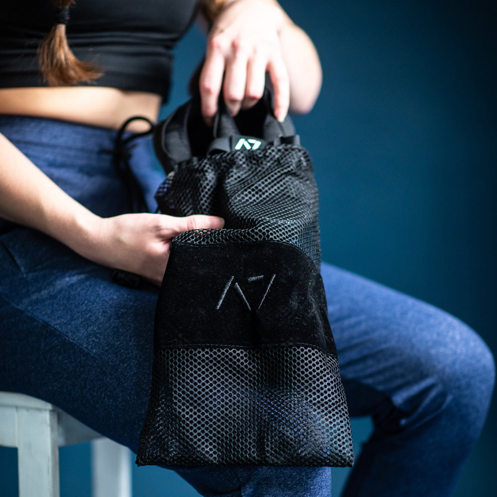 
                      
                        Simply designed with you in mind. With a 5 mm thin rubber grip sole, single pull diagonal/ Centre tension strap, all plastic components to allow easy washing, and even a convenient storage bag. These Soul Sumo v2 slippers are sure to impress. These slippers are ultra-compact and when rolled up are about the size of your wrist wraps. Our Soul Sumo Slippers are approved for IPF competitions and make a great addition to any IPF approved kit! A7 UK shipping to UK and Europe.
                      
                    