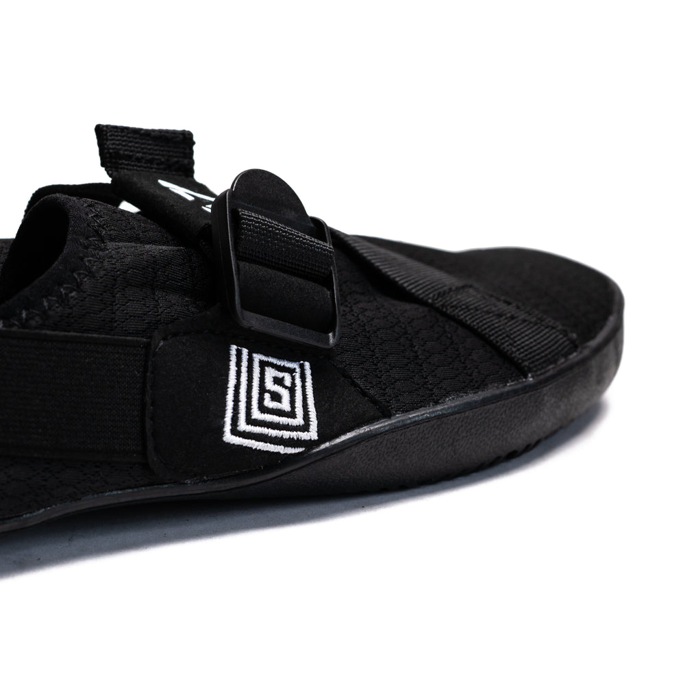 
                      
                        Simply designed with you in mind. With a 5 mm thin rubber grip sole, single pull diagonal/ Centre tension strap, all plastic components to allow easy washing, and even a convenient storage bag. These Soul Sumo v2 slippers are sure to impress. These slippers are ultra-compact and when rolled up are about the size of your wrist wraps. Our Soul Sumo Slippers are approved for IPF competitions and make a great addition to any IPF approved kit! A7 UK shipping to UK and Europe.
                      
                    
