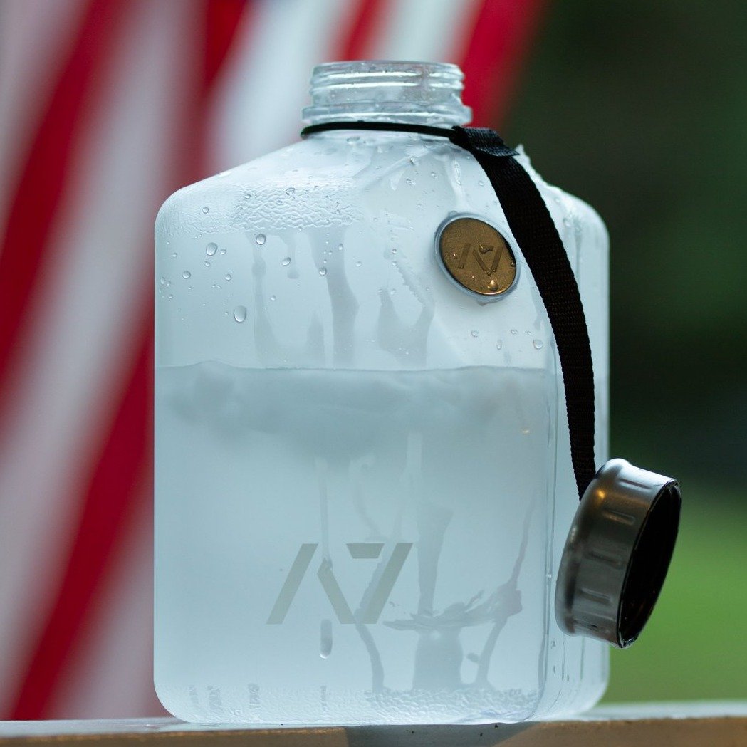 Stay hydrated during your workout with an A7 Water Jug. The jug is great for long workouts. It features a magnetic phone attachment so you can keep your phone close while you workout.  Simply stick the magnet on the back of the phone and pop the phone onto the bottle and your are ready to record your next set or even watch a video.