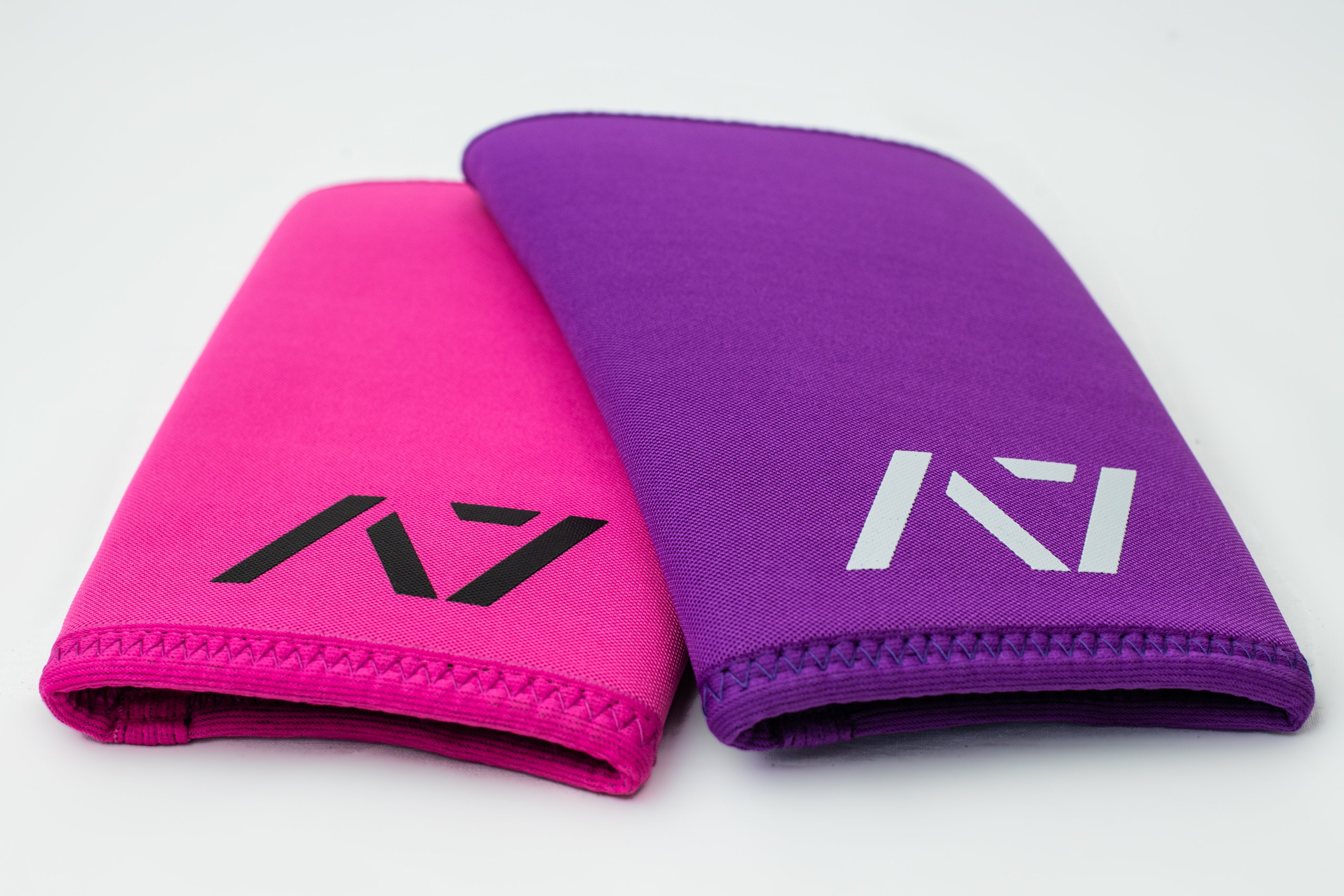 A7 IPF approved Purple CONE knee sleeves are structured with a downward cut panel on the back of the quad and calf to ensure ultimate compression at the knee joint. A7 CONE knee sleeves are IPF approved for use in all powerlifting competitions. A7 CONE Knee Sleeves are IPF Approved Kit. A7 cone knee sleeves are made with high quality neoprene and the knee sleeves are sold as a pair. The double seam on the knee sleeves create a greater tension on the knee joint. A7 UK shipping to UK and Europe. 