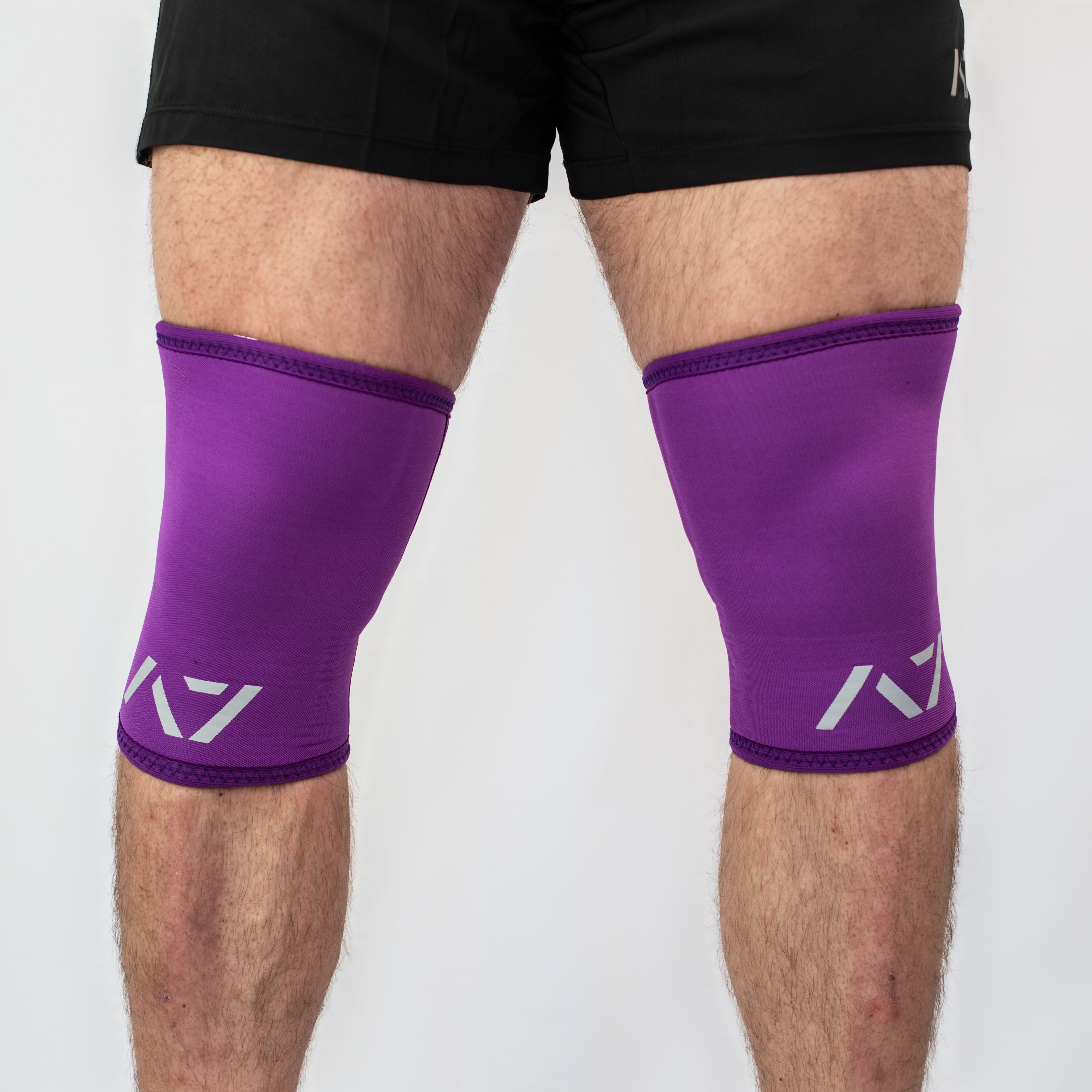 A7 IPF approved Purple CONE knee sleeves are structured with a downward cut panel on the back of the quad and calf to ensure ultimate compression at the knee joint. A7 CONE knee sleeves are IPF approved for use in all powerlifting competitions. A7 CONE Knee Sleeves are IPF Approved Kit. A7 cone knee sleeves are made with high quality neoprene and the knee sleeves are sold as a pair. The double seam on the knee sleeves create a greater tension on the knee joint. A7 UK shipping to UK and Europe. 