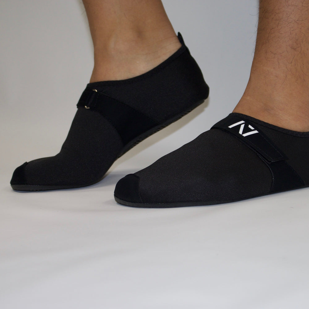 
                      
                        A7 Deadlift slippers easy to slip on and off and get close to the ground. IPF approved deadlift slippers. Deadlift slippers with a 3mm sole that can be used for squats, bench, deadlift or just lounging around the house. The best Powerlifting apparel and clothes for all your workouts, shipping to UK and Europe from A7 UK. Deadlift slippers. Soul Go slippers are the perfect IPF approved kit for IPF competitions. Available in UK and Europe including France, Italy, Germany, Sweden and Poland
                      
                    