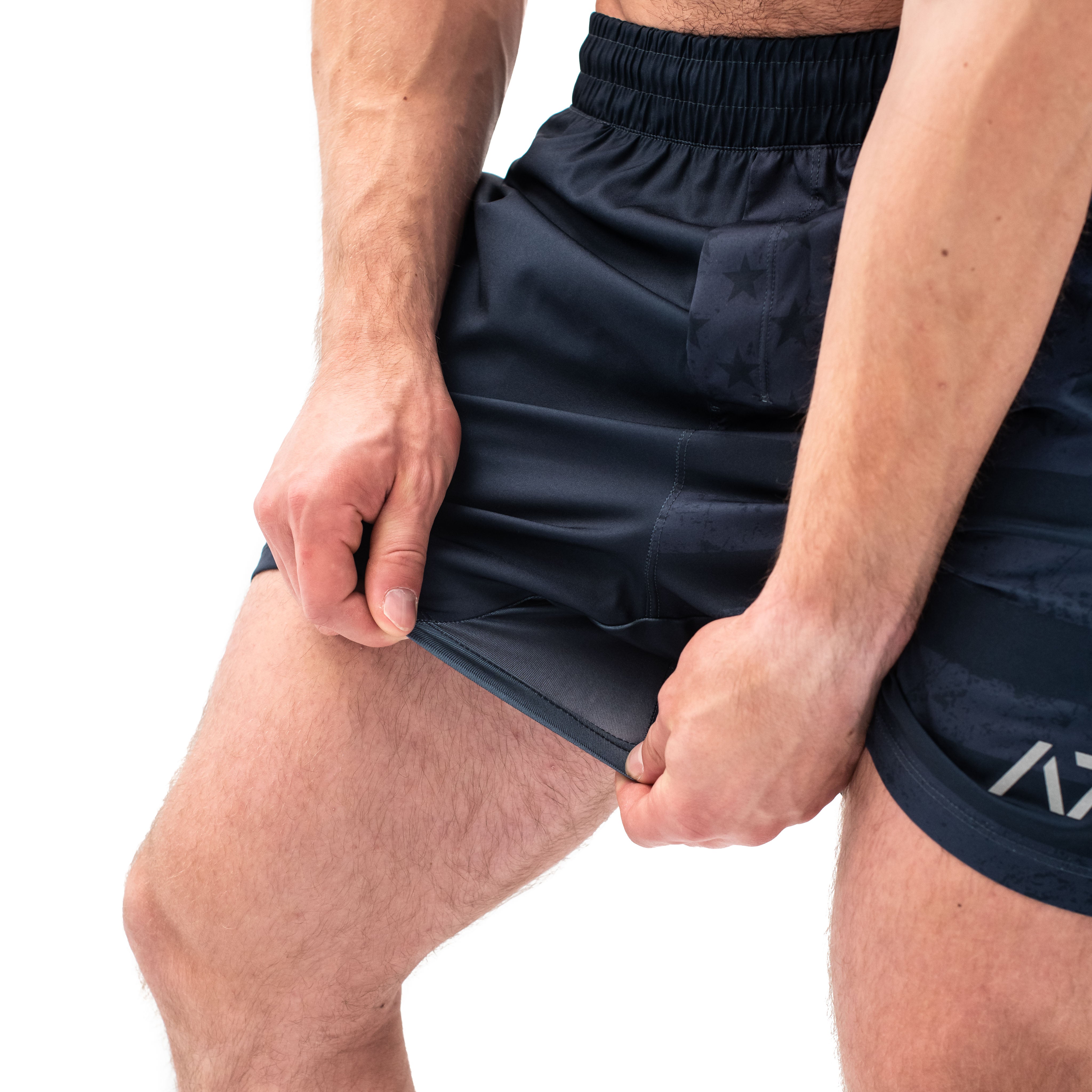 Have you ever squatted in shorts and realised that they may be too tight on you at the bottom of a squat? We have solved this problem with A7 Centre-stretch Squat Shorts. The shorts are made with stretchy fabric in between legs so you are never constricted during your squat. KWD shorts have a shorter inseam and are designed to show off your quads (KWaDs).