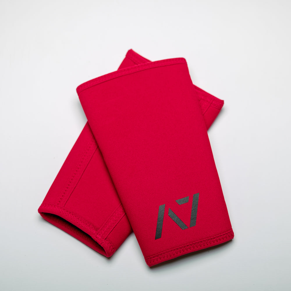 A7 IPF approved Fire Red CONE knee sleeves are structured with a downward cut panel on the back of the quad and calf to ensure ultimate compression at the knee joint. A7 CONE knee sleeves are IPF approved for use in all powerlifting competitions. A7 CONE Knee Sleeves are IPF Approved Kit. A7 cone knee sleeves are made with high quality neoprene and the knee sleeves are sold as a pair. The double seam on the knee sleeves create a greater tension on the knee joint. A7 UK shipping to UK and Europe. 