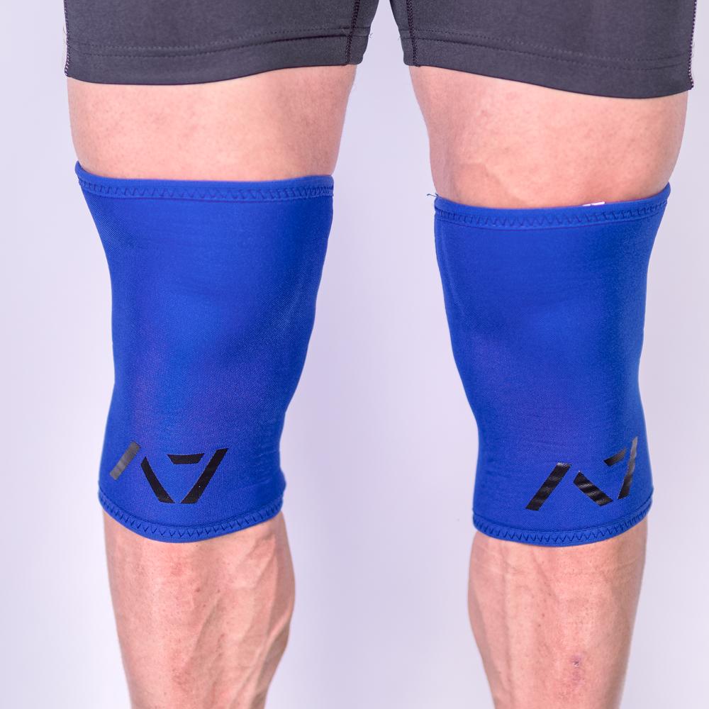 A7 IPF approved Blue CONE knee sleeves are structured with a downward cut panel on the back of the quad and calf to ensure ultimate compression at the knee joint. A7 CONE knee sleeves are IPF approved for use in all powerlifting competitions. A7 cone knee sleeves are made with high quality neoprene and the knee sleeves are sold as a pair. The double seem on the knee sleeves create a greater tension on the knee joint. Available in UK and Europe including France, Italy, Germany, Sweden and Poland