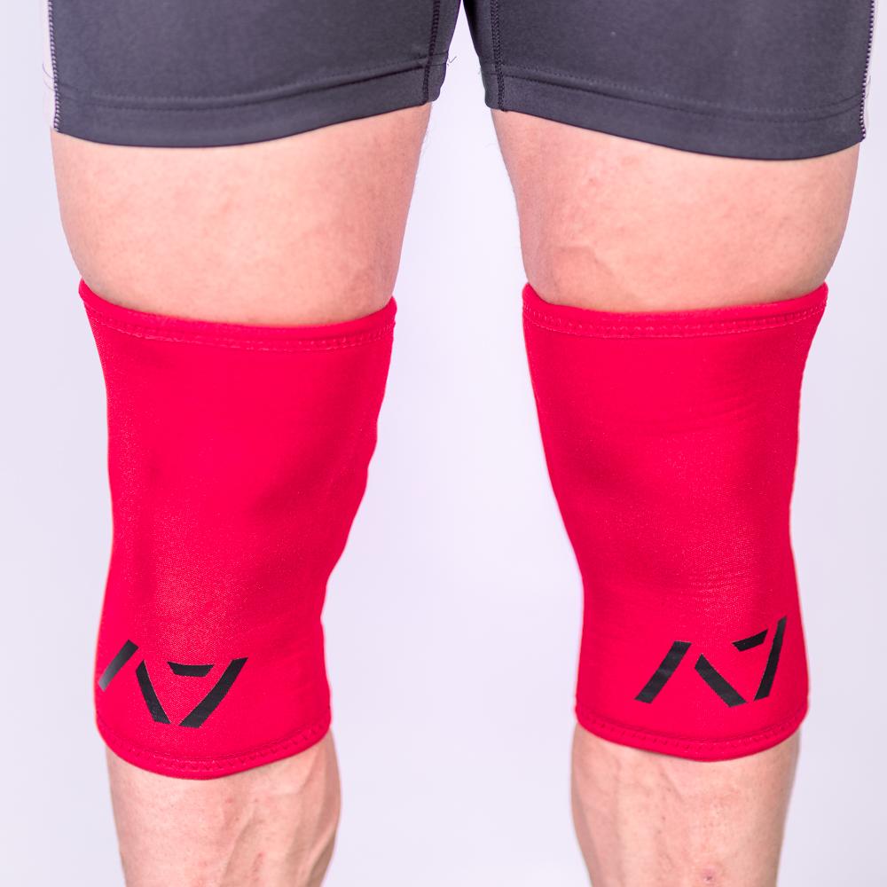 A7 IPF approved Fire Red CONE knee sleeves are structured with a downward cut panel on the back of the quad and calf to ensure ultimate compression at the knee joint. A7 CONE knee sleeves are IPF approved for use in all powerlifting competitions. A7 CONE Knee Sleeves are IPF Approved Kit. A7 cone knee sleeves are made with high quality neoprene and the knee sleeves are sold as a pair. The double seam on the knee sleeves create a greater tension on the knee joint. A7 UK shipping to UK and Europe. 